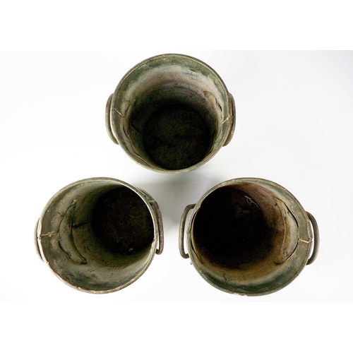 537 - Three galvanised florist buckets. Height 29cm. (3)