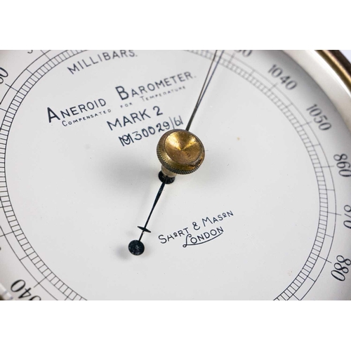 538 - A Short & Mason Mark 2 Ministry aneroid barometer. Diameter 13.5cm, together with an Italian globe l... 