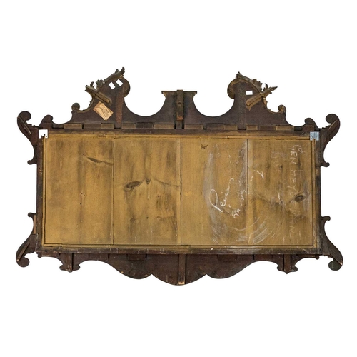 59 - A 19th century mahogany fret work framed mirror. Gesso gilt decoration. Height 81cm width 135.5cm.