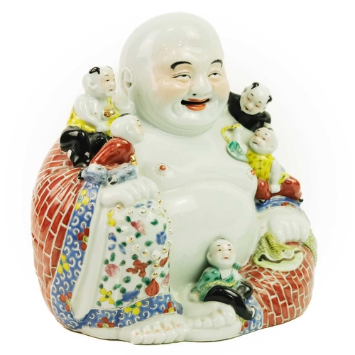 11 - A large Chinese porcelain model of Buddha, 20th century. With five boys and oval seal mark to base, ... 