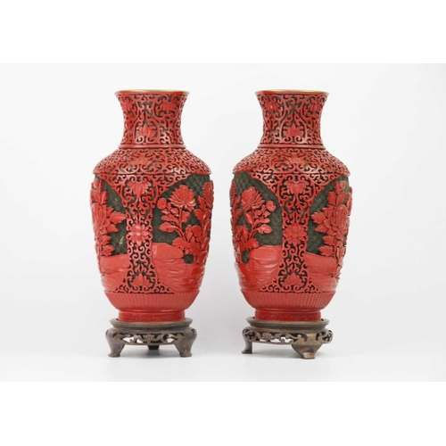 119 - A pair of Chinese cinnabar lacquer vases, early-mid 20th century. Height 26cm, width 12.5cm and a pa... 