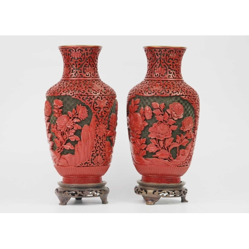 119 - A pair of Chinese cinnabar lacquer vases, early-mid 20th century. Height 26cm, width 12.5cm and a pa... 