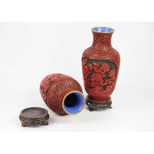 119 - A pair of Chinese cinnabar lacquer vases, early-mid 20th century. Height 26cm, width 12.5cm and a pa... 