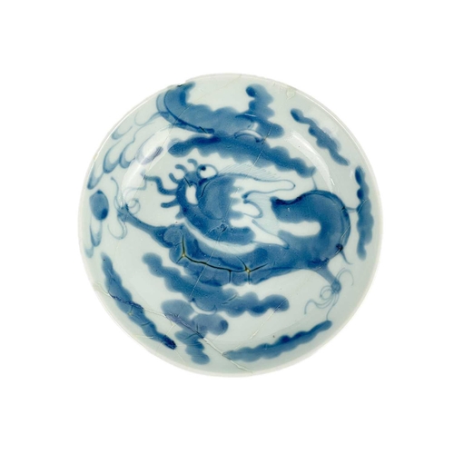 120 - A Chinese provincial blue and white bowl. Height 6cm, diameter 14cm, two Chinese blue and white drag... 