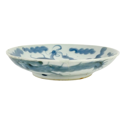 120 - A Chinese provincial blue and white bowl. Height 6cm, diameter 14cm, two Chinese blue and white drag... 