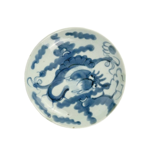 120 - A Chinese provincial blue and white bowl. Height 6cm, diameter 14cm, two Chinese blue and white drag... 