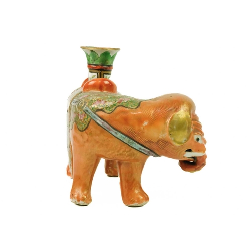 125 - A Chinese Canton famille rose 'elephant' candlestick, Qing Dynasty, 19th century. With a vase-shaped... 