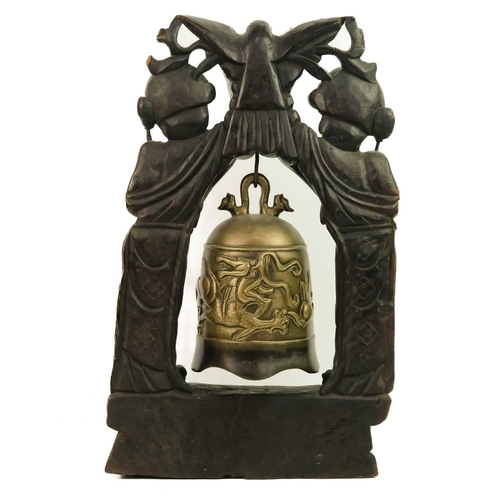 126 - A Chinese bronze temple bell, Qing Dynasty, 19th century. The carved hardwood frame with wire inlay,... 