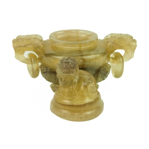 137 - A Chinese agate incense burner on stand, late Qing Dynasty.. The cover surmounted with a dog of fo a... 