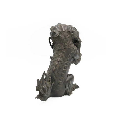 141 - A Chinese bronze 'lion dog' incense burner, Qing Dynasty, 19th century. With detachable head, the pa... 