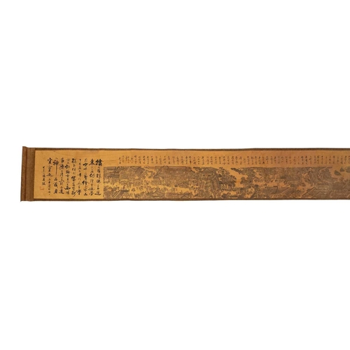 145 - A Chinese printed silk on paper scroll, late Qing Dynasty. Depicting calligraphy and a street and ri... 