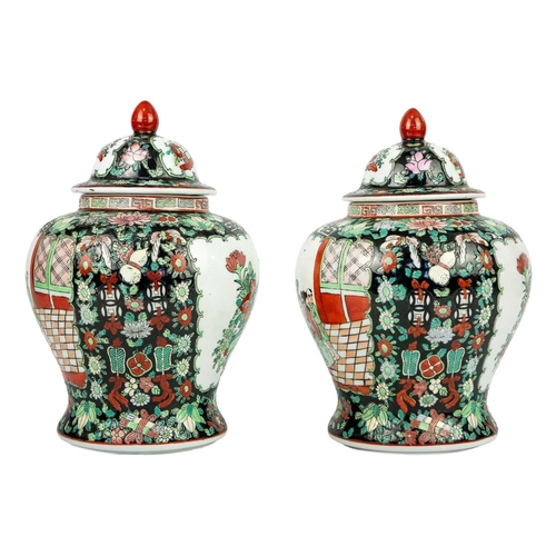 146 - A pair of Chinese famille noire baluster vases, early-mid 20th century. Red seal mark and old paper ... 