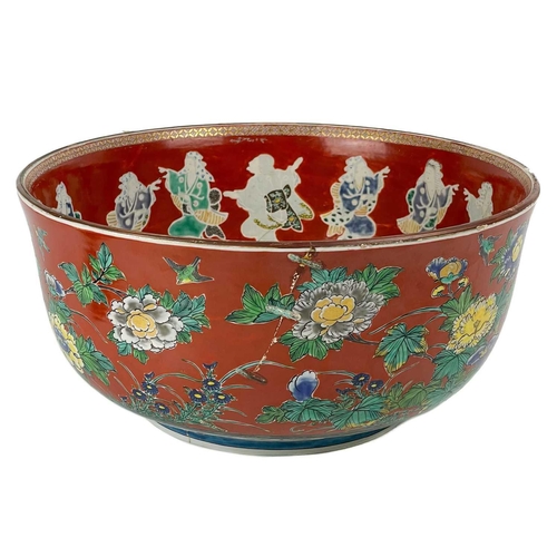 161 - A Japanese porcelain punch bowl, late 19th century, The interior decorated with dancing geisha surro... 