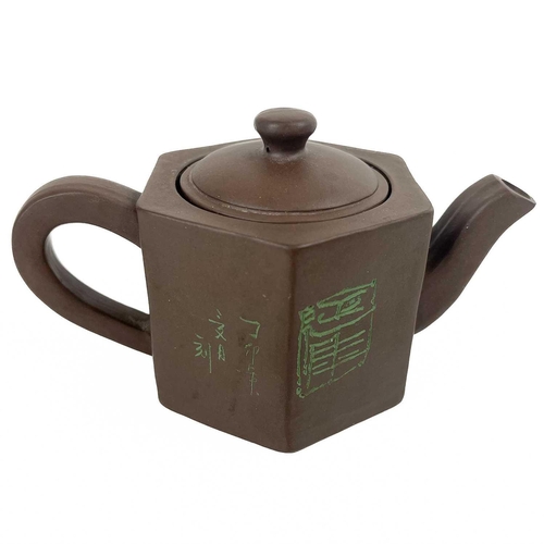 167 - A Chinese hexagonal Yixing teapot. With character marks to body and underside with seal, height 7cm,... 