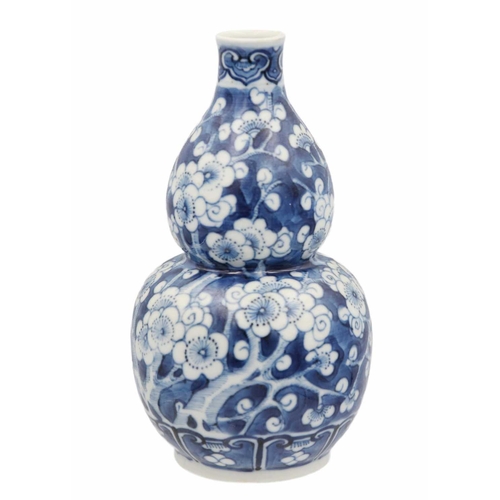 17 - A Chinese porcelain prunus pattern double gourd vase, early 20th century. Height 17cm. From the pers... 