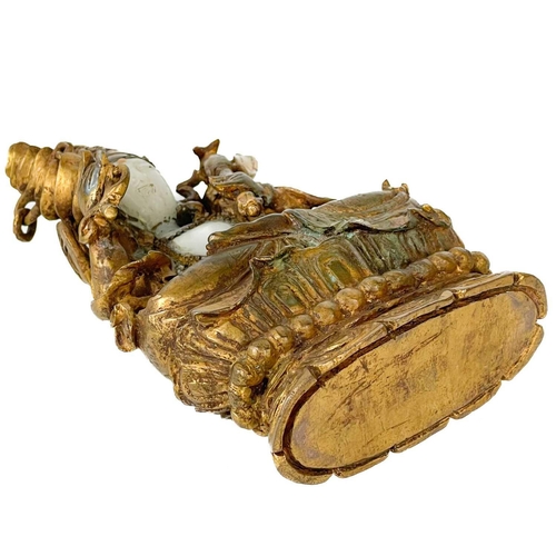 171 - A Chinese white and gilded jade seated Buddha, 18th/19th century. Seated upon a lotus base, with som... 