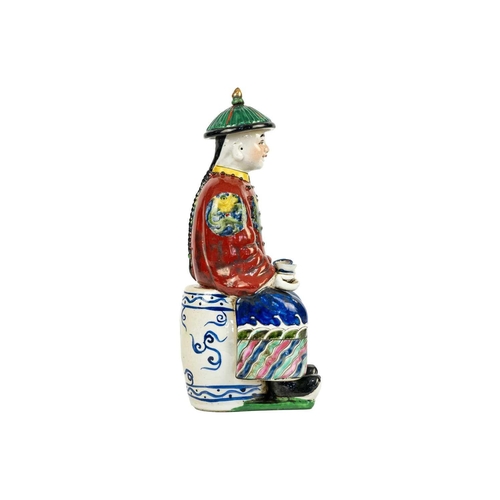 175 - A Chinese porcelain figure of a seated Emperor, 20th century. Two seal marks to base, height 27cm, w... 