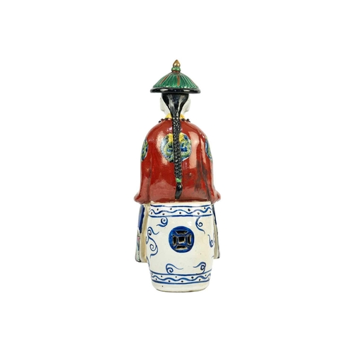 175 - A Chinese porcelain figure of a seated Emperor, 20th century. Two seal marks to base, height 27cm, w... 