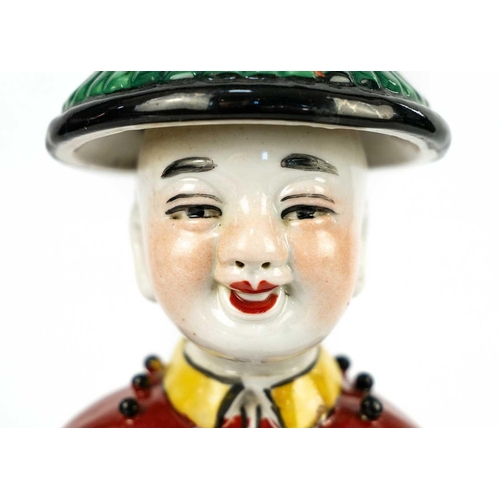 175 - A Chinese porcelain figure of a seated Emperor, 20th century. Two seal marks to base, height 27cm, w... 