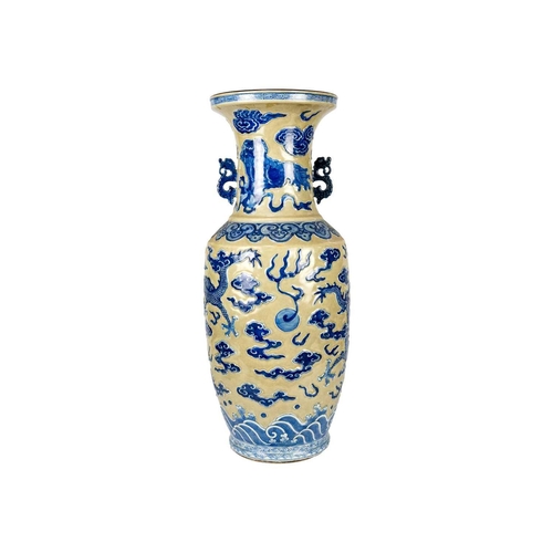 18 - A large Chinese floor standing baluster 'dragon' vase, late 19th century. With a pair of chilong han... 