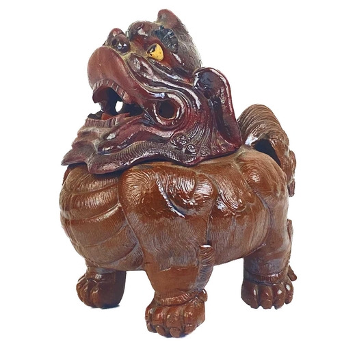 183 - A Chinese pottery incense burner, circa 1900. In the form of a dog of fo, height 17cm, width 15cm, d... 