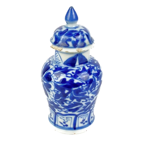 188 - A small Chinese blue and white porcelain vase, 19th century. With cover, height 10cm, width 5cm.