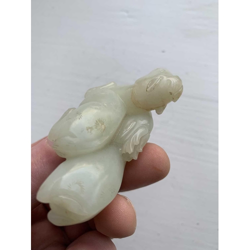 2 - A Chinese carved celadon jade group of deers, Qing Dynasty, 19th century. Height 4.8cm, width 7cm, d... 