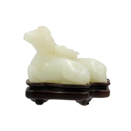 2 - A Chinese carved celadon jade group of deers, Qing Dynasty, 19th century. Height 4.8cm, width 7cm, d... 