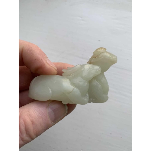 2 - A Chinese carved celadon jade group of deers, Qing Dynasty, 19th century. Height 4.8cm, width 7cm, d... 