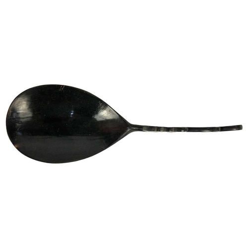 209 - A Chinese black stained carved wood ladle, early-mid 20th century. The handle in the form of a drago... 