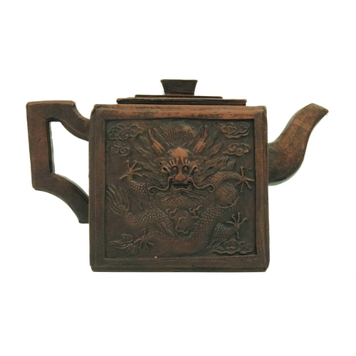 216 - A Chinese Yixing teapot, 20th century. Decorated with stylised dragons, character marks to finial, s... 