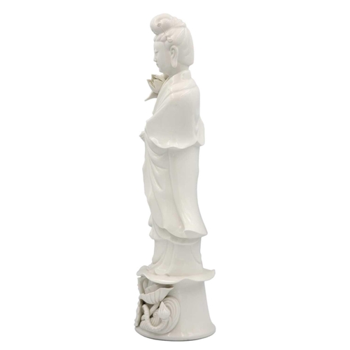 217 - Two Chinese blanc de chine figures of Guanyin, 20th century. Height 38.5cm, width 10cm, depth 9cm. (... 