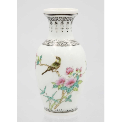 221 - Two Chinese porcelain tankards, 18th century. Height 13.3cm, diameter 10cm and height 12cm, diameter... 