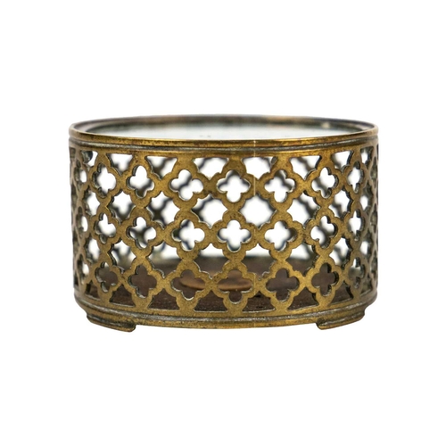 234 - A Chinese pierced brass circular cricket cage, early 20th century. With a glazed top and wooden base... 