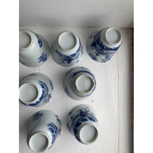 25 - A set of Chinese blue and white porcelain cups, covers and stands, 18th century. Late Kangxi period,... 