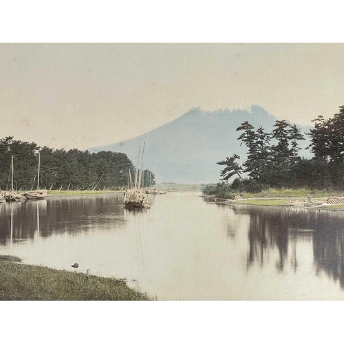 260 - A Japanese photo album containing 50 hand coloured images, circa 1900. To include views of Toyio, 'M... 