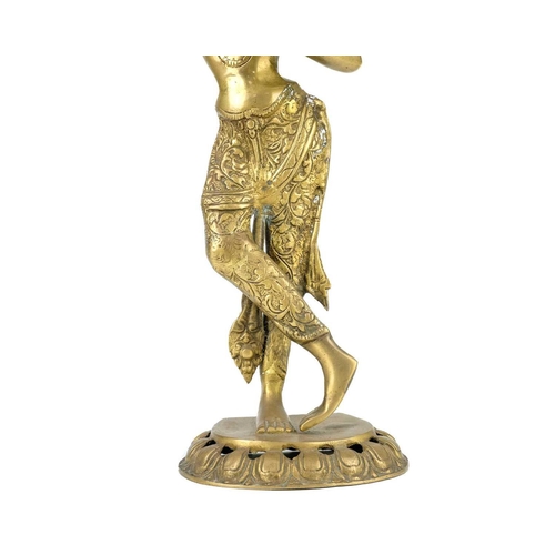 273 - A Tibetan brass figure of a dancing lady, 20th century. Height 47cm, width 14.3cm, depth 10.5cm.