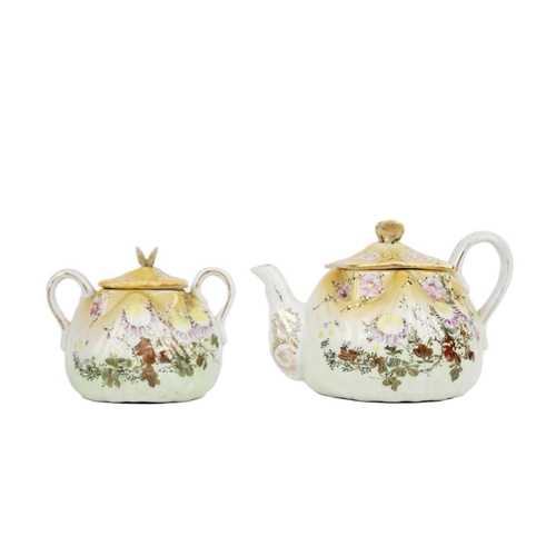 274 - A Japanese porcelain tea service, early 20th century. Floral and gilt decorated, comprising a teapot... 