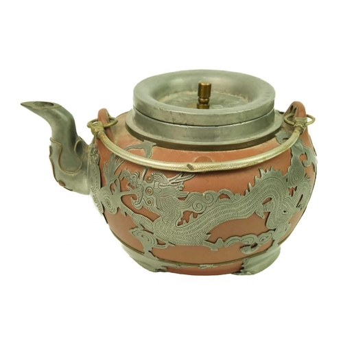 278 - A Chinese Yixing pottery teapot, early 20th century. With pewter mounts, character marks to cover, s... 