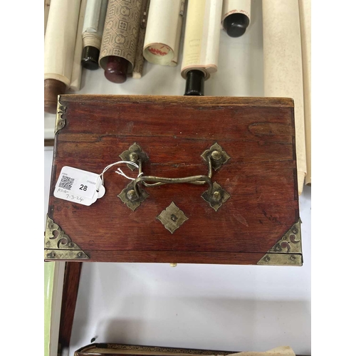 28 - A mahogany cased mahjong set. The lift up front with character marks, opening to reveal five drawers... 