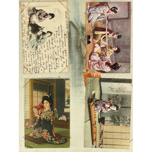 289 - A Japanese black lacquered and silk lined postcard album, early 20th century. Containing seventy-two... 