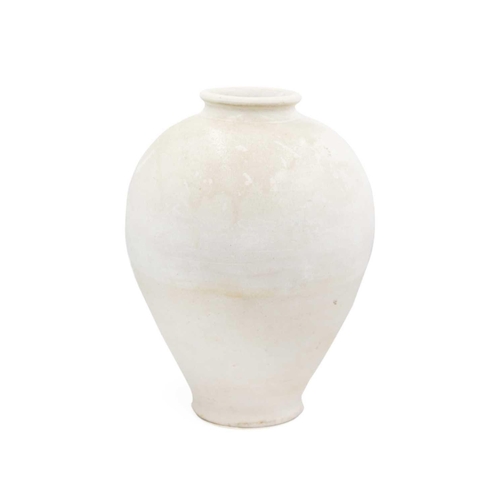 29 - A Korean pottery vase, Choson Dynasty. The ovoid body with a central line beneath a short flared rim... 