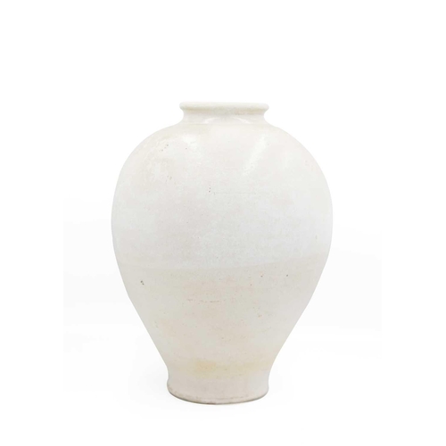 29 - A Korean pottery vase, Choson Dynasty. The ovoid body with a central line beneath a short flared rim... 