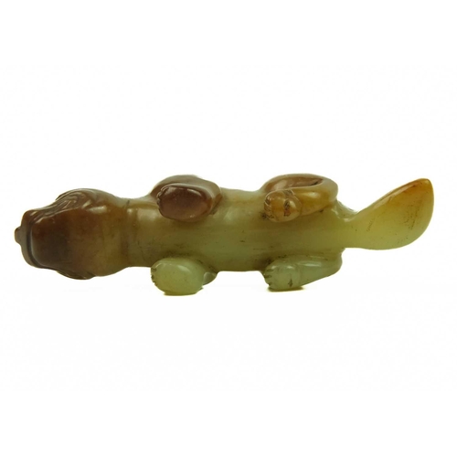 3 - A Chinese russet jade tiger, Qing Dynasty, 19th century. Height 3cm, length 7.3cm, depth 2cm, on a f... 