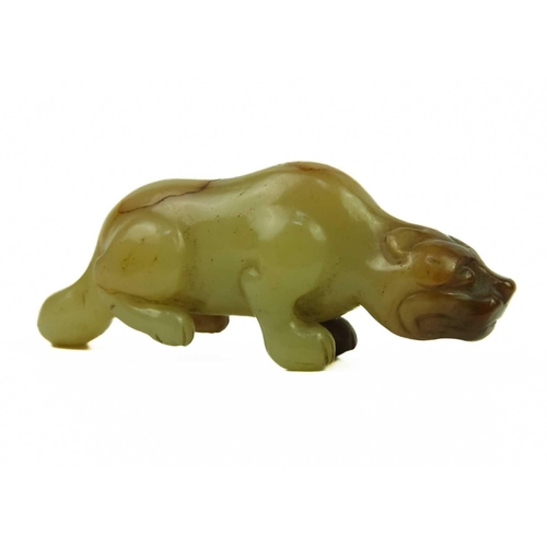 3 - A Chinese russet jade tiger, Qing Dynasty, 19th century. Height 3cm, length 7.3cm, depth 2cm, on a f... 