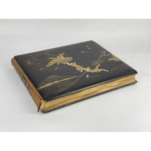 302 - A Japanese hand coloured photo album with lacquer cover, Meiji period. The black lacquer cover decor... 