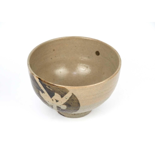 308 - A large Japanese footed pottery bowl, by Shoji Hamada. With a ribbed tapering body and foot, decorat... 