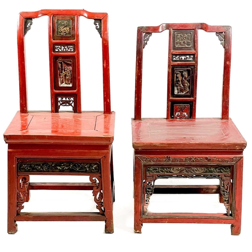 324 - Four Chinese red stained and lacquered side chairs, mid 20th century. Each with a carved splat above... 