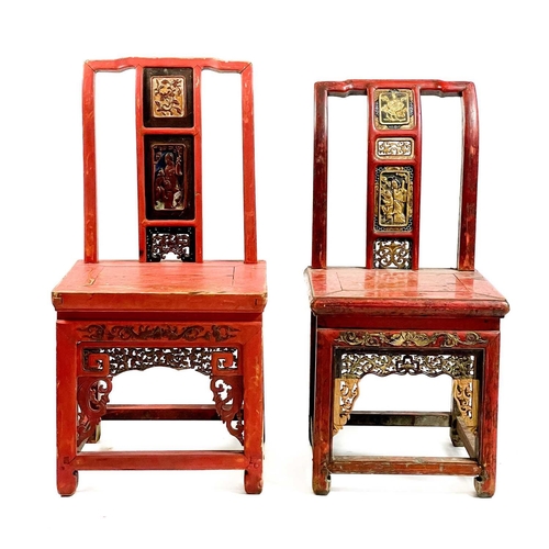 325 - Four Chinese red stained and lacquered side chairs, mid 20th century. Each with a carved splat above... 