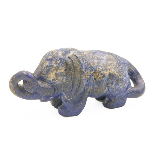 329 - A Chinese lapis lazuli model of an elephant on stand, Qing Dynasty, 19th century. Height of elephant... 